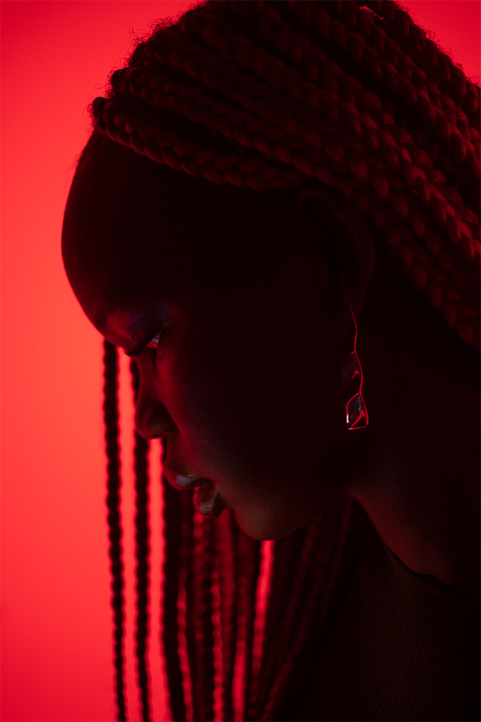 Photo of a girl in red light